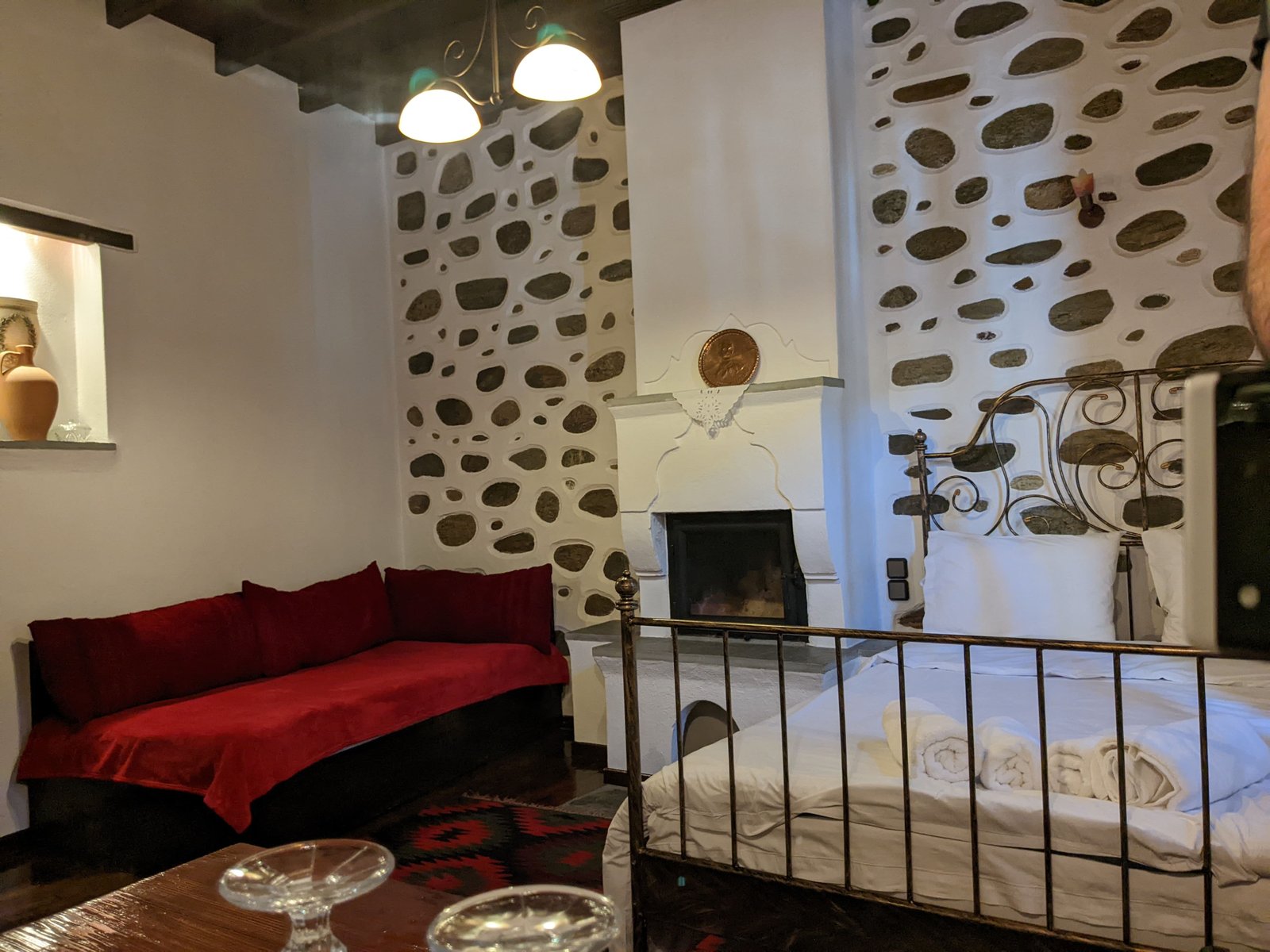 Paradosiako room — classic architecture with timber beams and stone detail